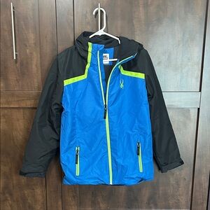 Spyder Kids Blue and Black Puffer Jacket with Green Accents